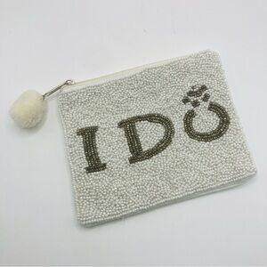 Shirdee white and silver “I do” beaded zippered pouch with pom.